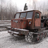 Old Russian skidder. Early loggers used draft animals including mules, horses and oxen, to pull logs.