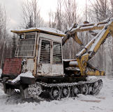 Old Russian log loader. Keeping these machines running is essential.