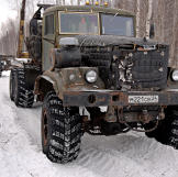 Logging truck at the cutting block in Siberia.