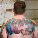 After: Tim Pangburn gave Brandon an awesome nautical cover-up tattoo.