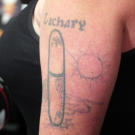 Before: Amanda shows off her hated tattoo, which she says gets mistaken for a ‘sexual apparatus.'