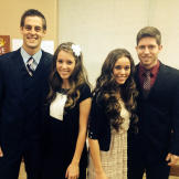 Derick, Jill, Jessa and Ben demonstrate how to do a side hug.