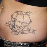 Before: Ney Ney models her “Beauty Hills” tattoo.