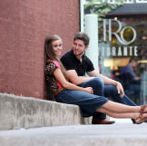 The soon-to-be Seewalds pose in downtown Fayetteville, Arkansas.