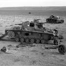 Damaged German Panzer IIIs in the "Valley of Death" near Belhamed, Libya, during Operation Crusader December 1941.
Watch video of the