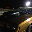 A closeup of Wayne Varley's (a.k.a Varley) 1980 Ford Mustang, aptly named “The Gold Car”