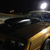A closeup of Wayne Varley's (a.k.a Varley) 1980 Ford Mustang, aptly named “The Gold Car”