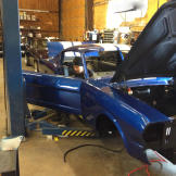 Anthony Makos works on a racer in the shop.