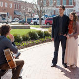 As part of the proposal, Derick has a country singer serenade Jill.