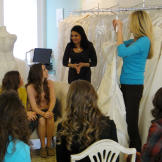 Jill goes to a bridal shop to try on dresses for her big day.