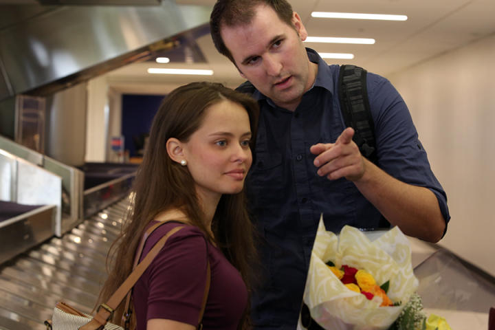 Alan and Kirlyam arrive in L.A. after a long flight from Brazil.