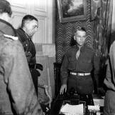 German surrender at Cherbourg, a key port for the German Navy during World War II. U.S. Major-General Joseph Lawton Collins, receives the signing of the instrument of surrender of the German General Staff.
