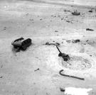 Every wonder what an atomic bomb would do to a tank? This aerial view demonstrates just that as an atomic bomb was detonated in proximity to one on May 1, 1952 at the AEC Nevada Proving Ground.
Watch video of the