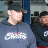 Justin Shearer (a.k.a. Big Chief) and Shawn Ellington (a.k.a. Murder Nova) hang out in the shop.