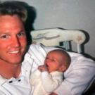 Meet baby Logan! Proud papa Kody poses with his first baby with Janelle.