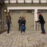 Amy Roloff jumps rope in the driveway with the help of her kids Molly, Jeremy and Jacob. The family would fall apart without Amy's caring and watchful eye making sure her kids, and especially her husband, are behaving themselves.