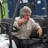 Matt's signature pose: sitting and talking on his cell phone. Due to his numerous business ventures, he spends much of the day with the phone to his ear.
