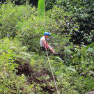 Zach rappelling down the waterfall.