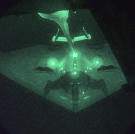 Looking like something straight out of science fiction, a B-2 refuels from a KC-10 Extender after completing a mission in support of NATO Operation Allied Force.