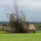 Tornadoes commonly take on a funnel-like shape, with the narrow end touching down on Earth. As they move along, they gather more dirt and debris, especially as they destroy the obstacles they encounter. Tornadoes can also form over water, as you'll see next.