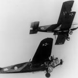 A closer view of the Fokker getting refueled by the Douglas C-1.