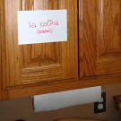 A few notecards around kitchen help the kids with their Spanish lessons.