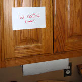 A few notecards around kitchen help the kids with their Spanish lessons.