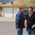 Doug Hopkins and Scott Menaged mix it up in the street.
