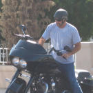 Buyer Ed Rosenberg fires up his Harley.