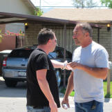 Turf infringement? Scott Menaged and Ed Rosenberg argue after bidding.