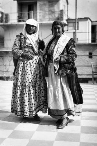 Greek gypsies wear traditional clothing in this photo from 1930.