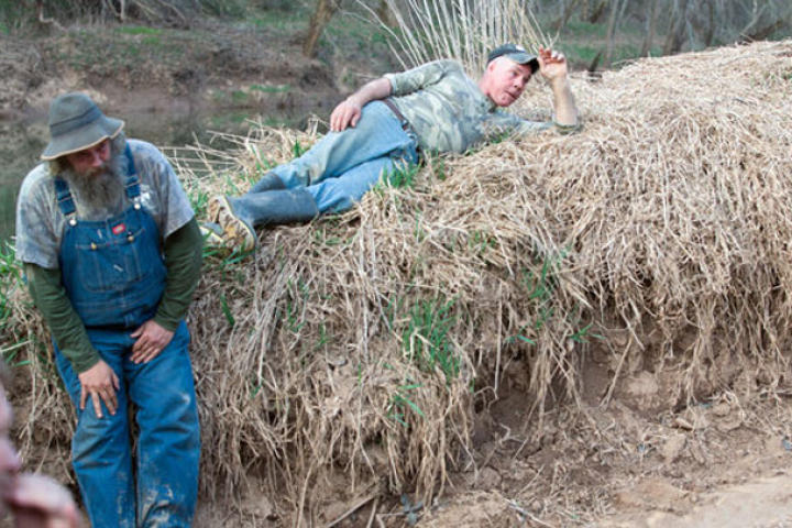 Huckleberry (left) and Wild Bill rest during one of the investigations.