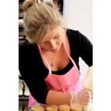 Only a delicate touch can create the signature icing swirl of Georgetown Cupcake.