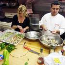Lisa & Buddy prepare a holiday meal for the bakery staff.
