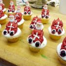 Some of the Santa cupcakes are still waiting for their heads.