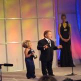 "I'd like to thank all the little people," jokes Bill as he and Jen accept the Gracie Award for The Little Couple.