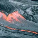 Volcano formation is the result of an eruption of underground gases and magma at a hot spot at a particular point on the earth. A flow of molten mineral that escapes the ground is known as lava, which eventually cools, hardens and produces the surface rock of the same name.
