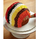 Continue piping your rings, alternating colors.