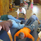 The Bates boys do push-ups as part of their wrestling lesson.