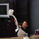 Aaden throws a roll of toilet paper while mom is away for her birthday