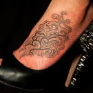 Tattoo by Ami James