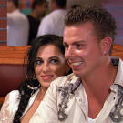 Mellie and Robbie share a tender moment over dinner.