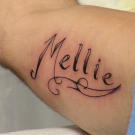 The tattoo artist sketched the design as "Millie." Good thing she caught the mistake before it became permanent!