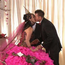 Mellie and Robbie share a kiss after swapping vows.