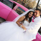 Amber and Pete embrace on their wedding day.