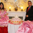 Chad and Angelina are dressed to the nines, but their smiles can't hide their hurt over a lack of attendance at the christening and reception.