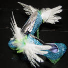 Jackie D.'s winged and blinged heels match her angelic costume.