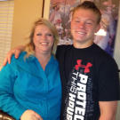Janelle with her son Hunter. Hunter says, "I love my mom because she is kind and she is always there to help me with things I need."