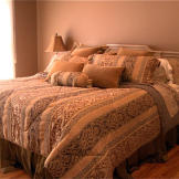 Take a photo tour of Valastro family homes! The ladies of Cake Boss invite you into their homes for a very special tour, beginning with Grace's house.
Grace's Bedroom