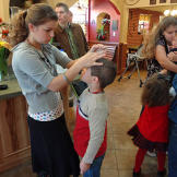The Bates kids spruce up in the morning.